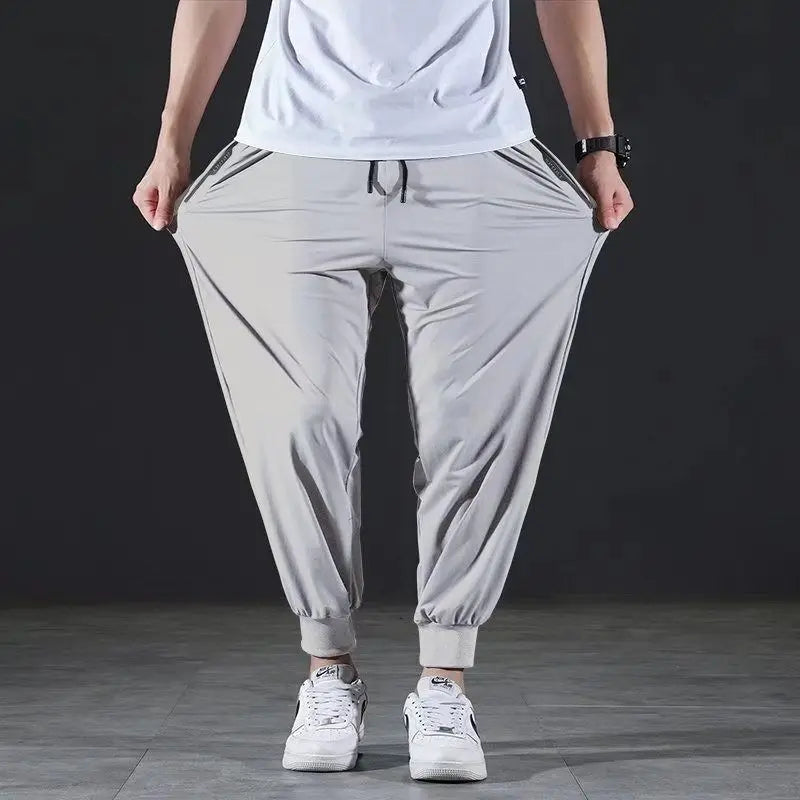 Quick-drying Ice Silk Ultra-thin Elastic Nine-point loose Pants