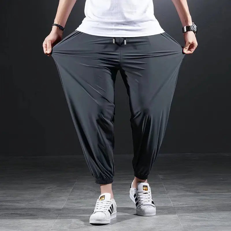 Quick-drying Ice Silk Ultra-thin Elastic Nine-point loose Pants