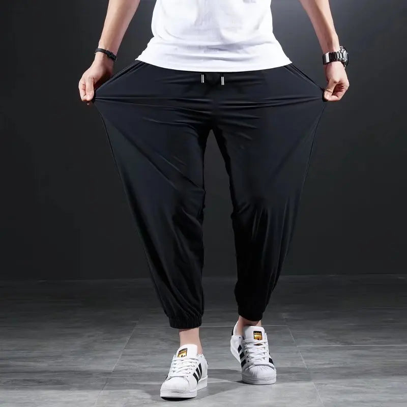 Quick-drying Ice Silk Ultra-thin Elastic Nine-point loose Pants